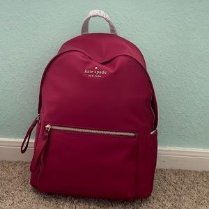 Kate spade large backpack in the color cranberry